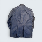 Back view of a blue jacket on a light gray background