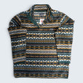 Patterned sweater with a brand tag on a light gray background