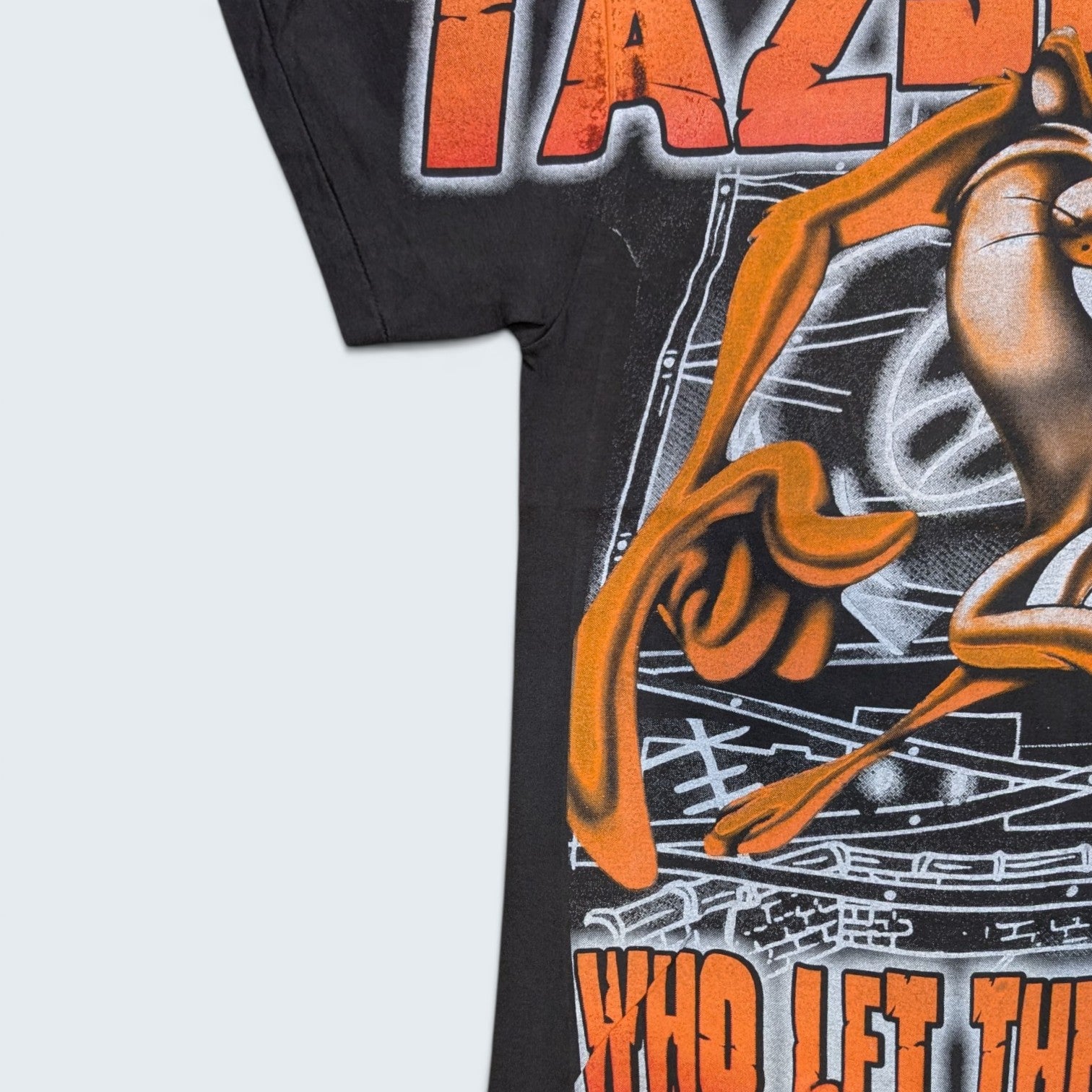 Taz-Mania Devil "Who let the Taz out?" Tee