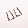 "The Bone" Silver Earrings