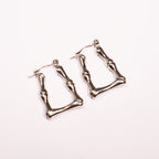"The Bone" Silver Earrings
