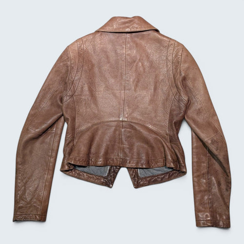 Back view of a vintage brown Banana Republic leather jacket with a peplum hem from STOXX THRIFT & VINTAGE