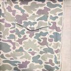 STOXX THRIFT & VINTAGE camo print chore jacket in heavy canvas with a button-flap chest pocket and zip closure.