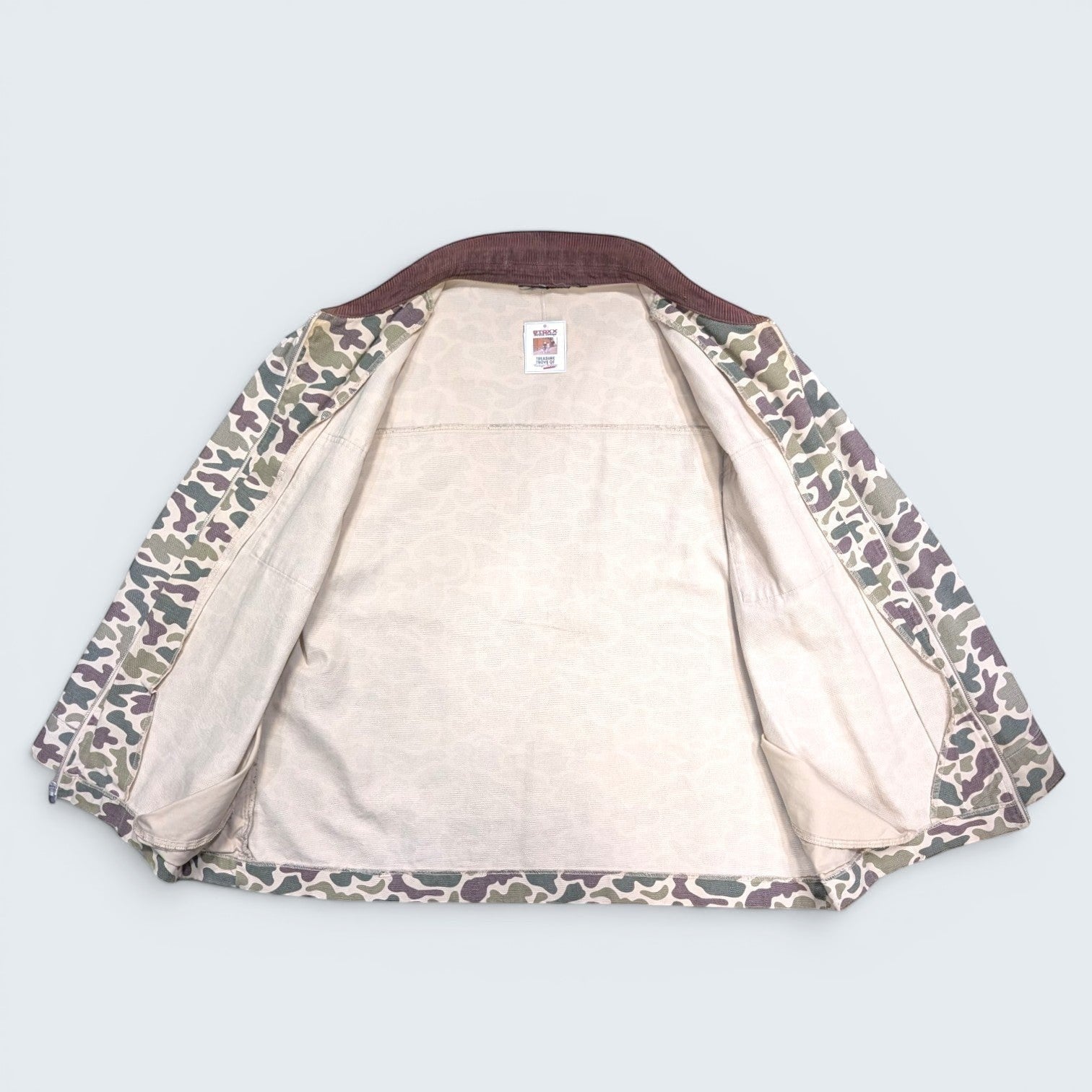 STOXX THRIFT & VINTAGE camo print chore jacket with a brown corduroy collar and cream interior lining in size XL.