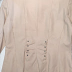 STOXX THRIFT & VINTAGE Danier cream leather jacket featuring back waist ruching with silver stud detailing.