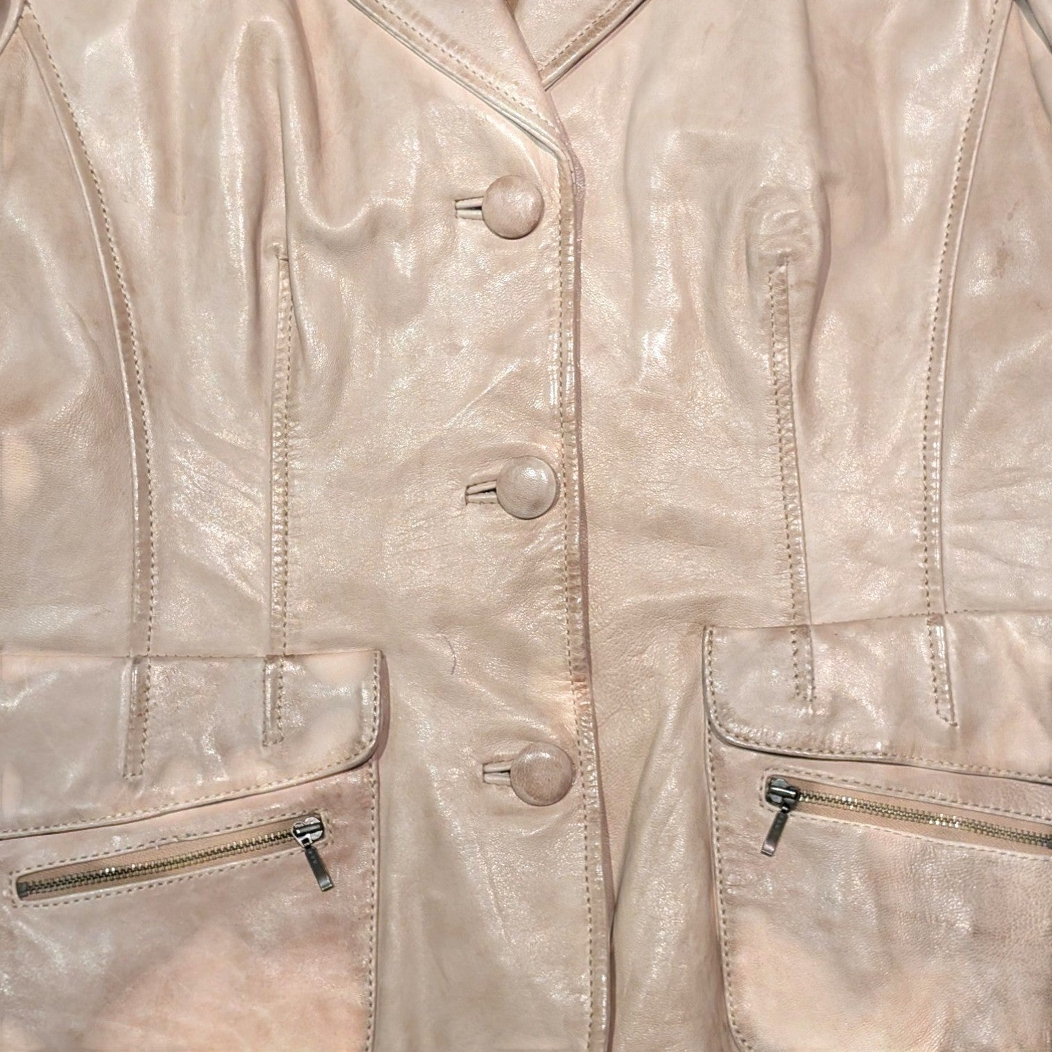 STOXX THRIFT & VINTAGE Danier beige leather blazer in size 2XL with button closure and front zipper pockets.