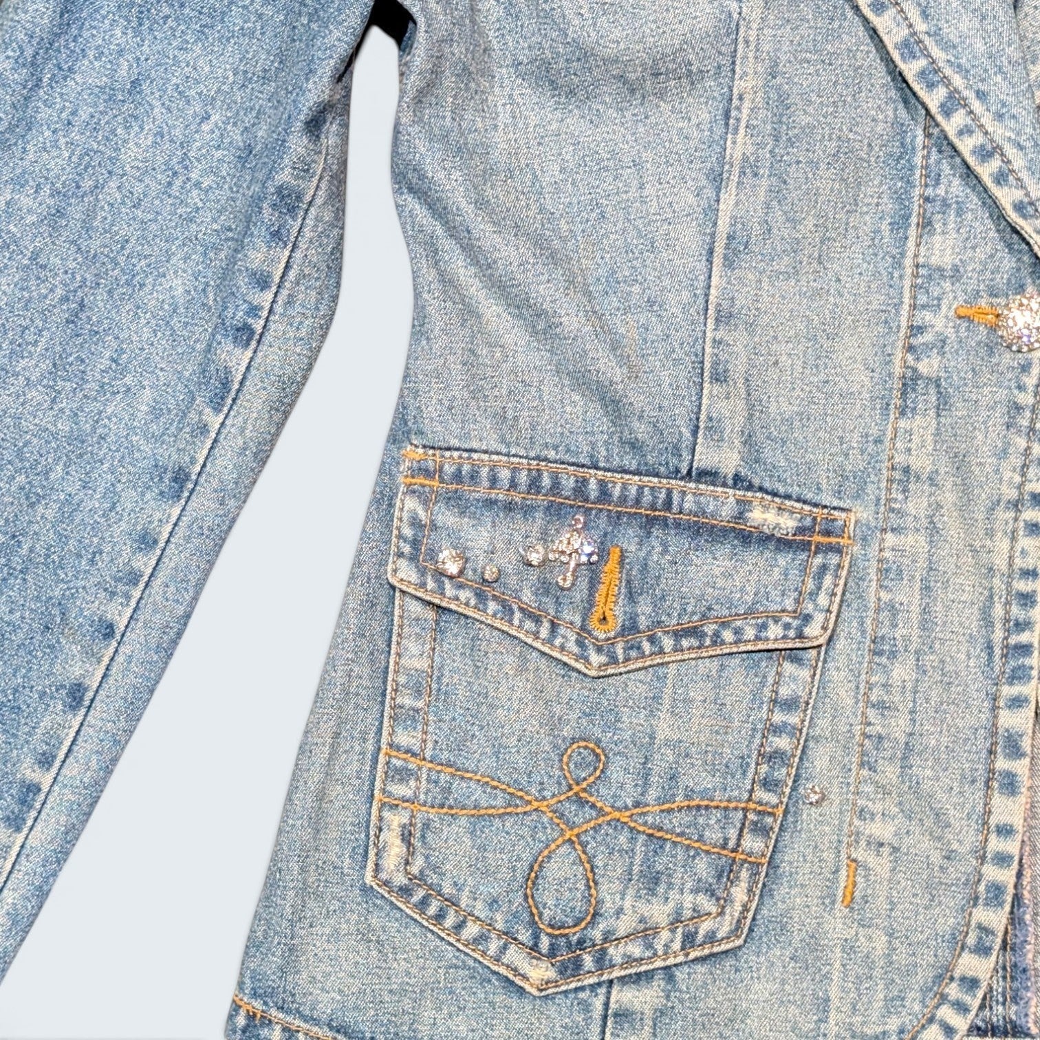 STOXX THRIFT & VINTAGE Together denim blazer jacket in light wash blue with rhinestone embellishments and pockets.
