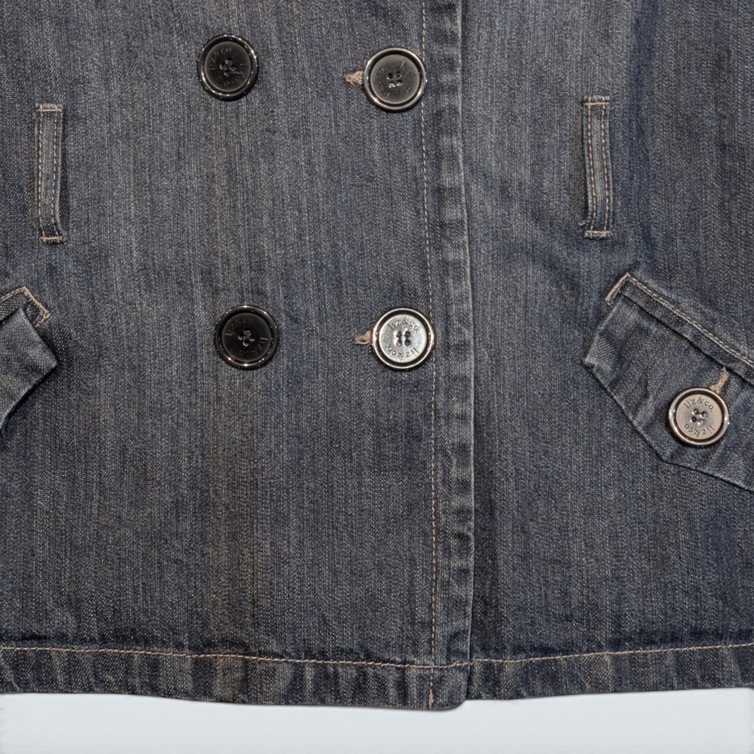 STOXX THRIFT & VINTAGE Liz&Co. dark wash denim coat featuring a double-breasted button front and flap pockets.