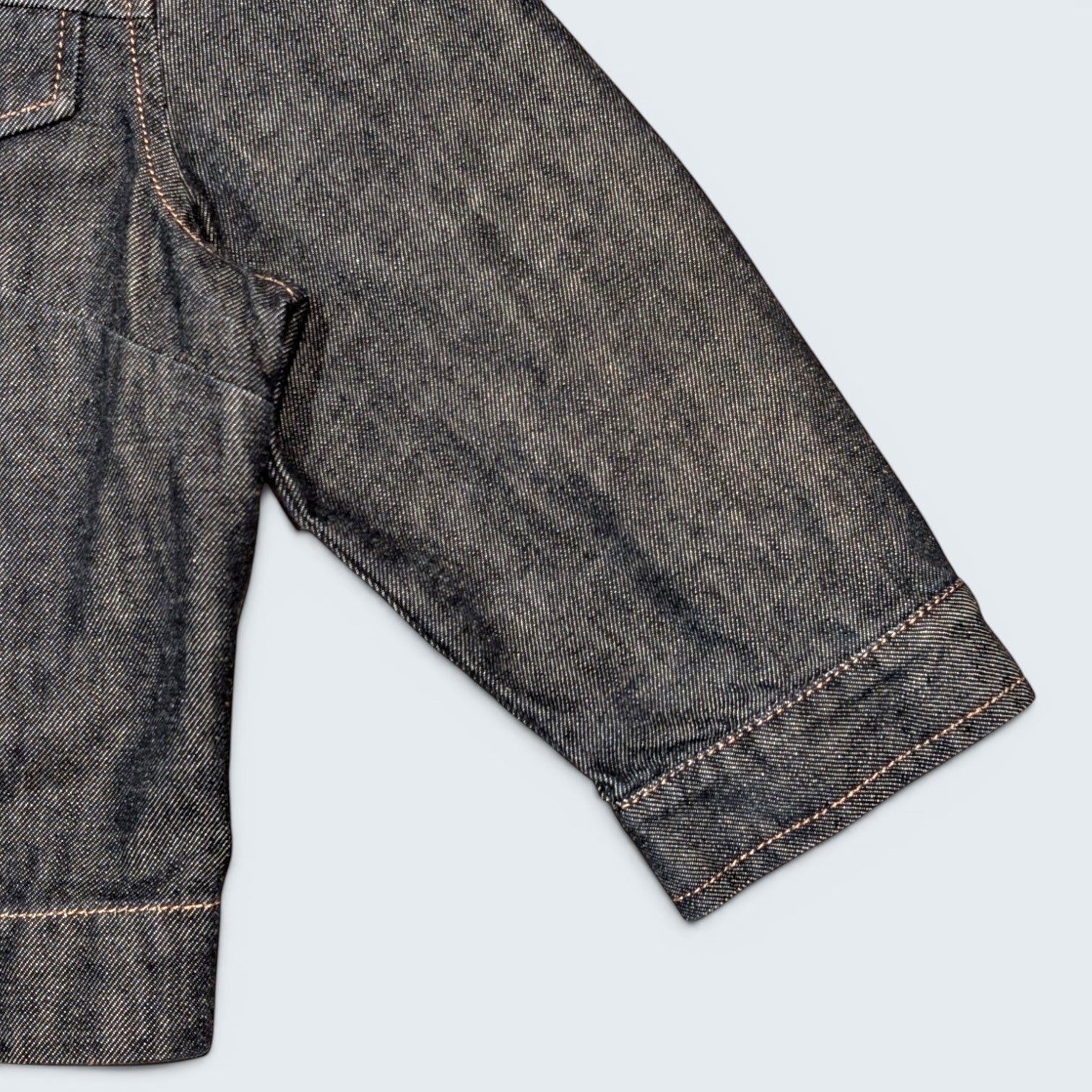 STOXX THRIFT & VINTAGE Dolce & Gabbana dark wash denim jacket sleeve with contrast stitching