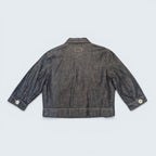Back view of a dark wash denim jacket by STOXX THRIFT & VINTAGE with button cuffs and classic collar.