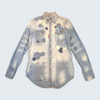 STOXX THRIFT & VINTAGE DSQUARED2 light wash denim shirt with circular patchwork, paint splatters, and button-down front.