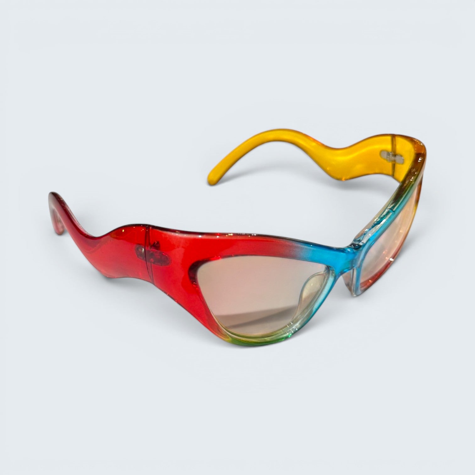 STOXX THRIFT & VINTAGE Eclare sunglasses with a transparent acetate frame featuring a red, blue, green, and amber gradient.