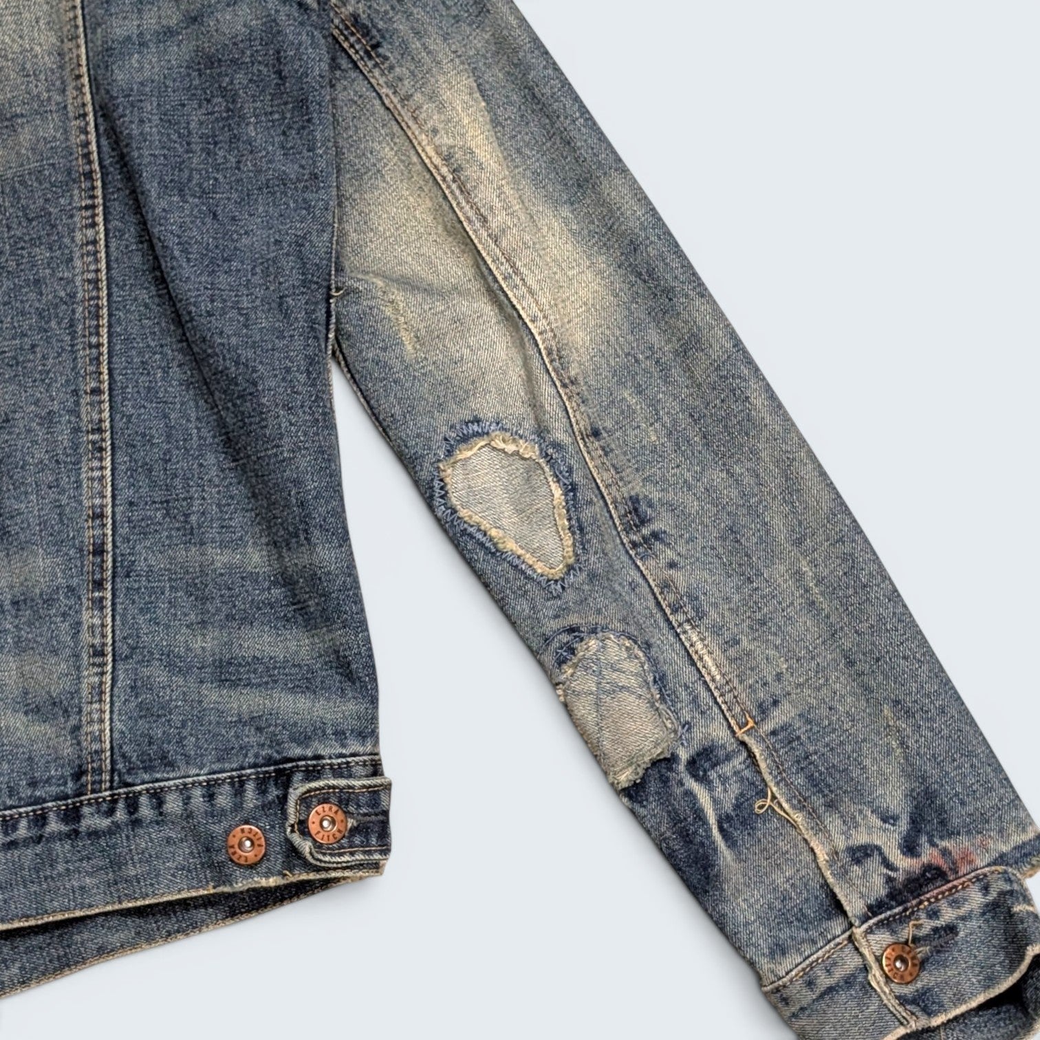 STOXX THRIFT & VINTAGE Ezra Fitch blue denim jacket with distressed sleeve detail and copper buttons.