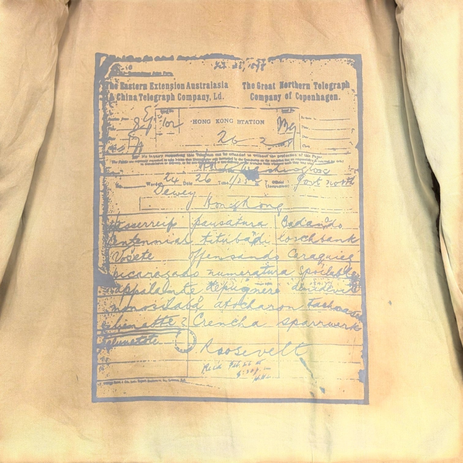 STOXX THRIFT & VINTAGE Ezra Fitch denim jacket interior lining featuring a vintage blue telegraph print design.