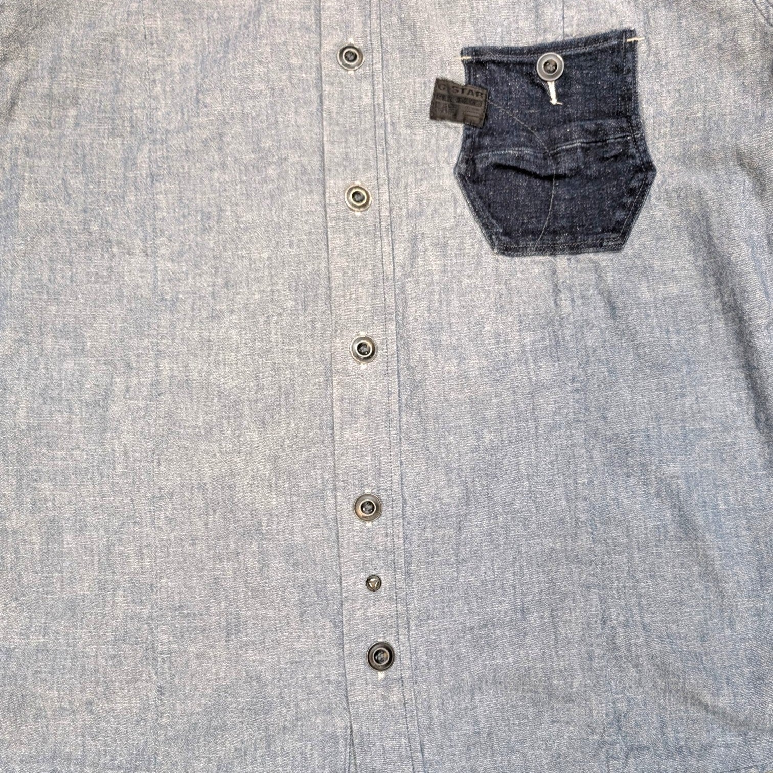 STOXX THRIFT & VINTAGE G-Star Raw light blue denim button-up shirt with a dark contrast chest pocket and logo tag.
