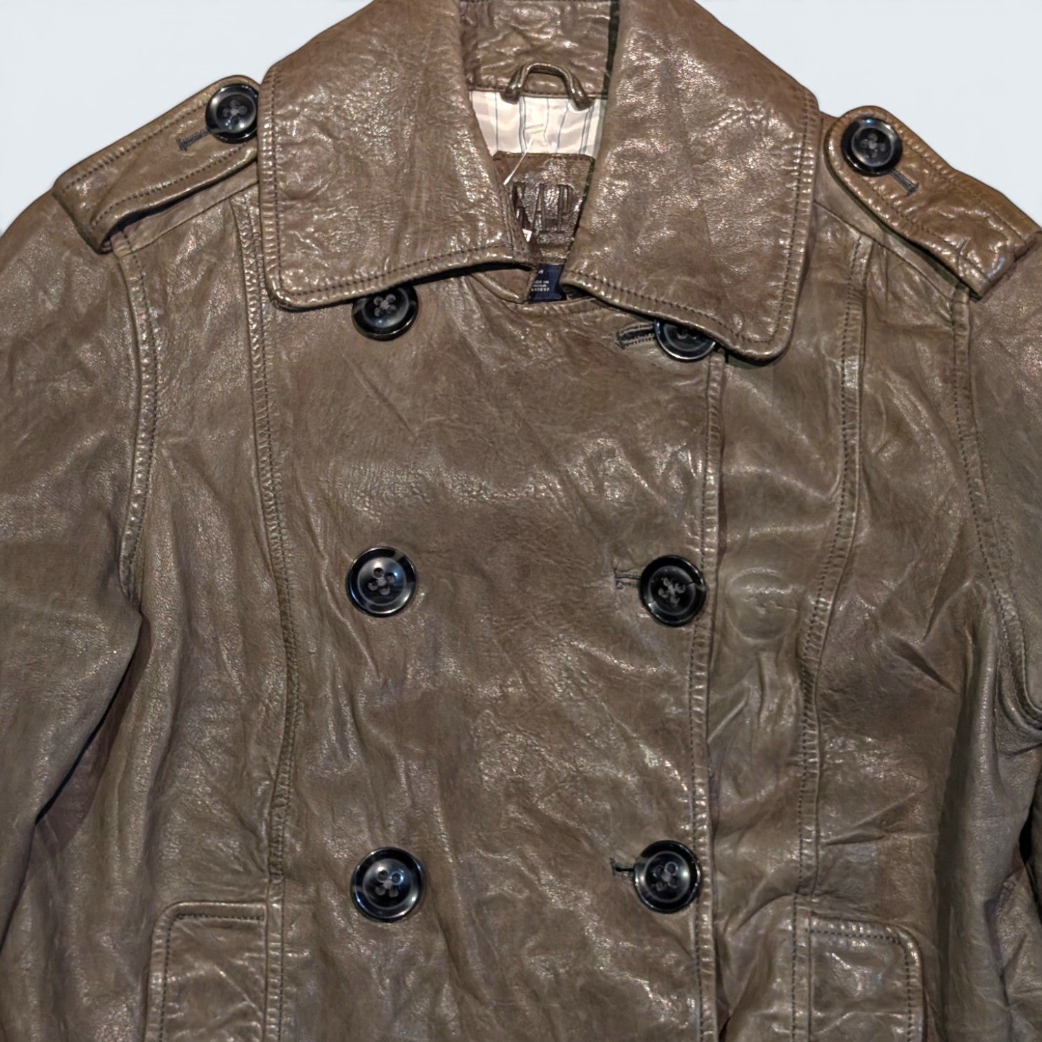 STOXX THRIFT & VINTAGE GAP brown leather double-breasted jacket with shoulder epaulettes and classic collar.