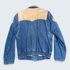 STOXX THRIFT & VINTAGE Guess blue denim jacket with tan leather western yoke and elasticized waistband.