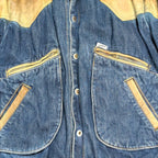 STOXX THRIFT & VINTAGE Guess blue denim jacket with tan leather western yoke and zippered pockets.