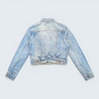 Back view of a light wash blue Harley Davidson denim jacket from STOXX THRIFT & VINTAGE with button cuffs.