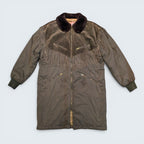 STOXX THRIFT & VINTAGE ICEBERG long brown coat featuring suede fringe detailing, fur collar, and zip-up front.