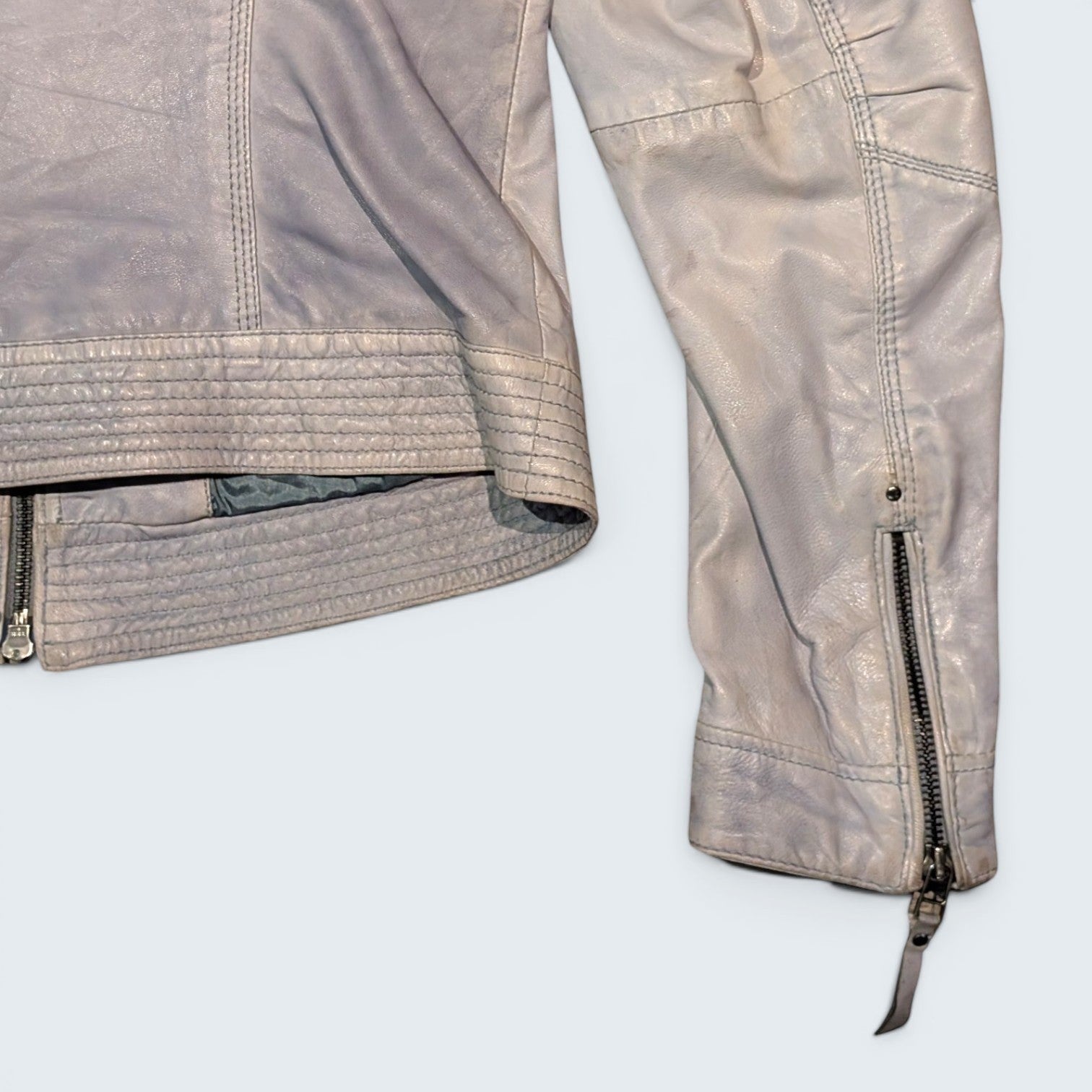 STOXX THRIFT & VINTAGE light grey leather biker jacket with ribbed hem and zippered sleeve cuffs.