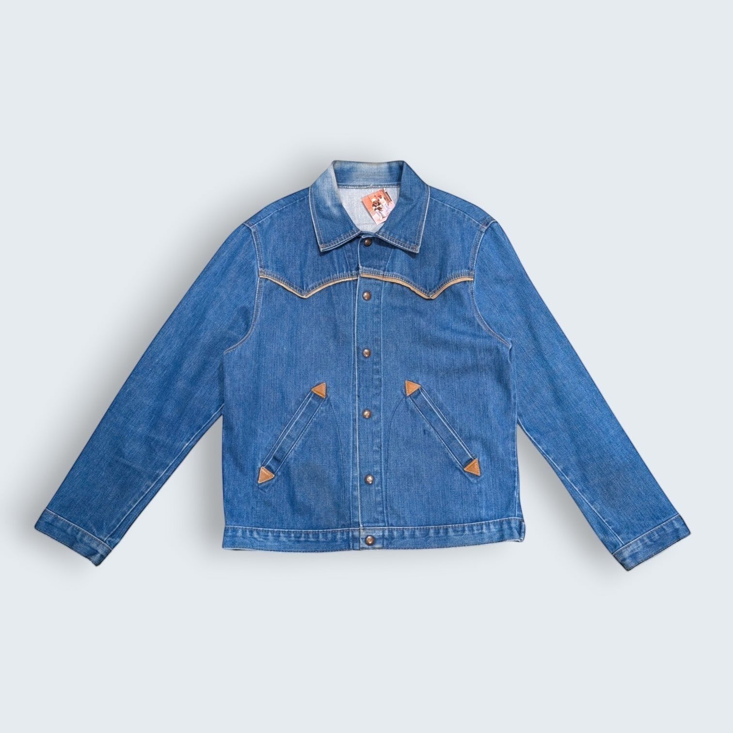 STOXX THRIFT & VINTAGE Rising Sun & Co. indigo denim cattleman jacket with leather pocket details and copper buttons.