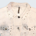 STOXX THRIFT & VINTAGE Natalia Paris light wash denim jacket with silver stud embellishments on collar and pockets.