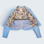 STOXX THRIFT & VINTAGE sky blue Danier leather jacket with a vibrant floral print lining and silver hardware.