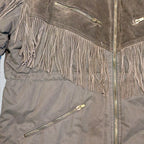 STOXX THRIFT & VINTAGE brown ICEBERG long fringe coat with suede yoke, zip pockets, and metallic hardware.
